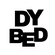 Black text 'DY BED' on a white background